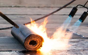 Crew asphalt flat roofing repairs